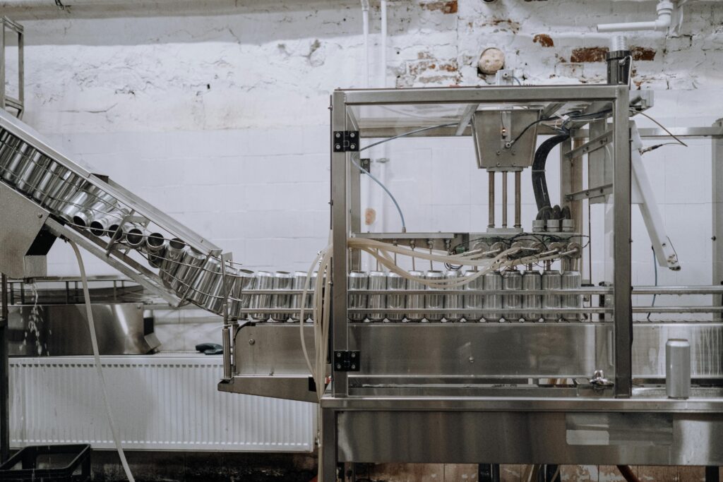 Aluminum Cans Passing Through the Assembly Line